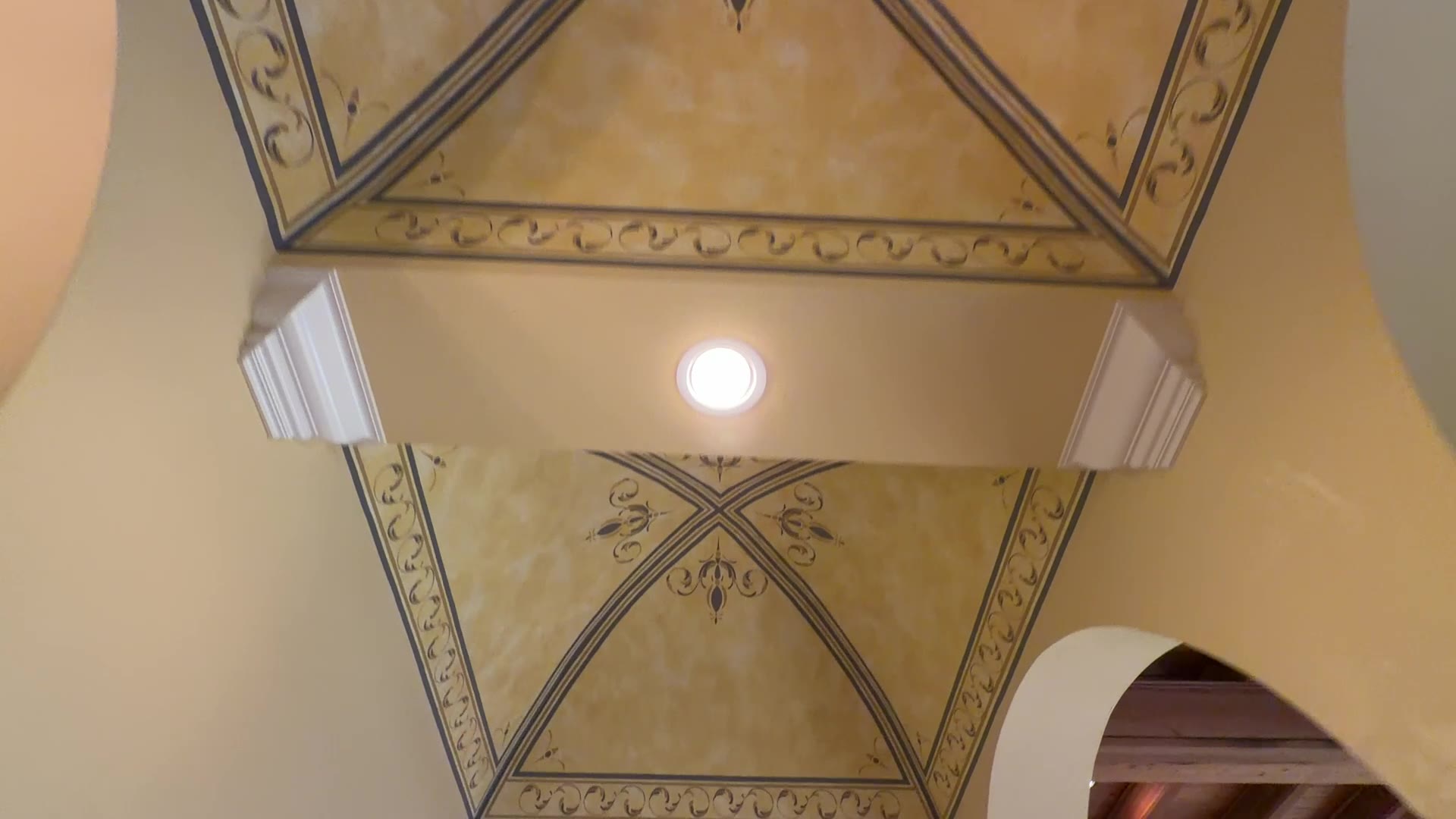 Hand-painted groin-vaulted ceiling on the second floor